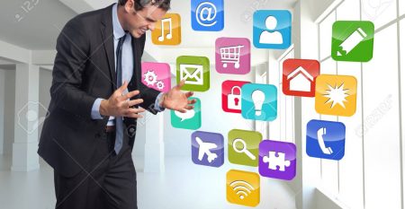 Stressed businessman gesturing against computing application icons Stressed businessman gesturing against computing application icons